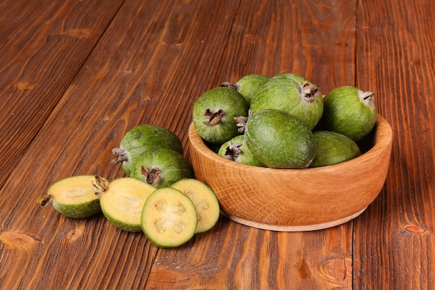 Fruits of feijoa in a wooden bowl on the table