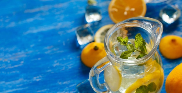 Fruits in glass jar on table