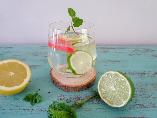 Fruits in glass on table