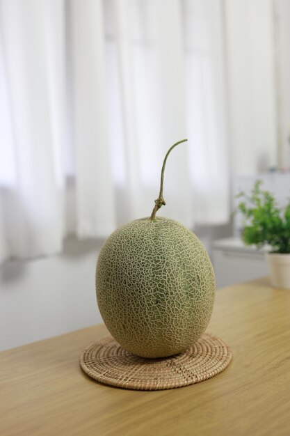 Fruits for healthcare Green Melon wooden table honey melon or cantaloupe