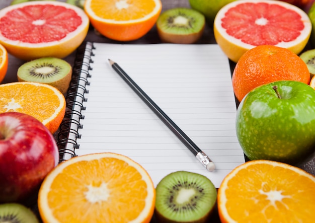 Fruits mix with notebook