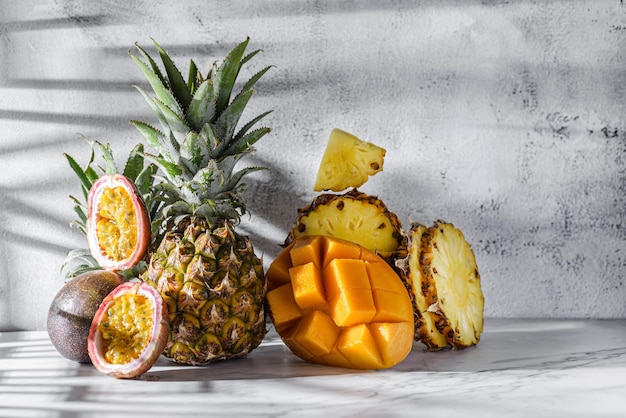 Photo fruits, pineapple, mango and passion fruit