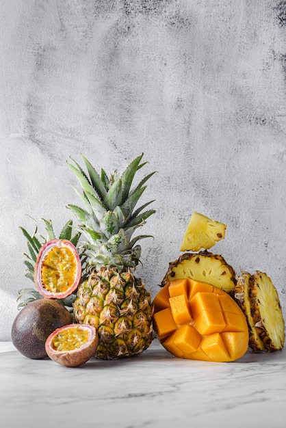 Photo fruits, pineapple, mango and passion fruit