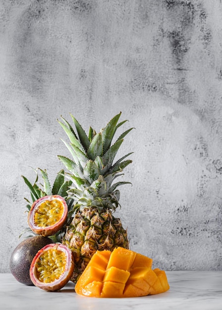 Photo fruits, pineapple, mango and passion fruit