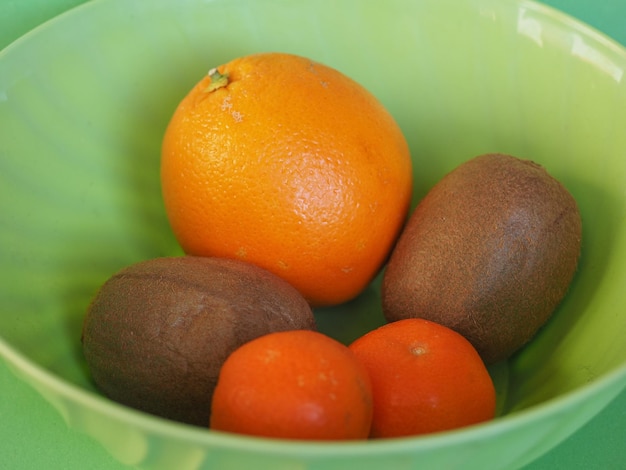 Fruits in plastic bowl