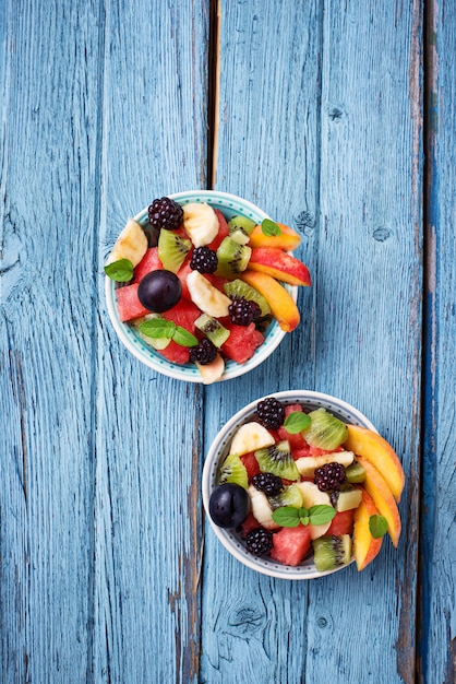 Photo fruits salad with watermelon, banana and kiwi