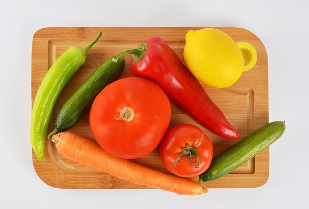 Fruits and vegetables on cutting board