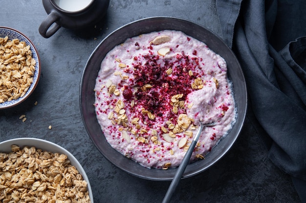 Fruity healthy muesli bowl on table