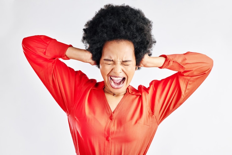 Photo frustrated screaming and black woman with stress anger and mistake on a white background in studio female person shouting and african model angry about fail or problem with rage emotion