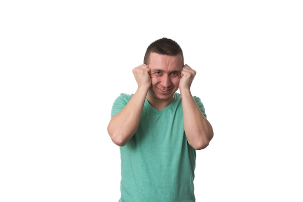 Frustrated Young Man With A Headache  Isolated Over White Background