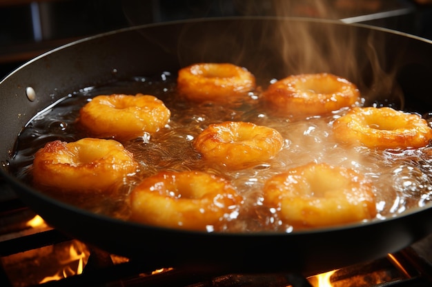 frying donuts on a hot pan