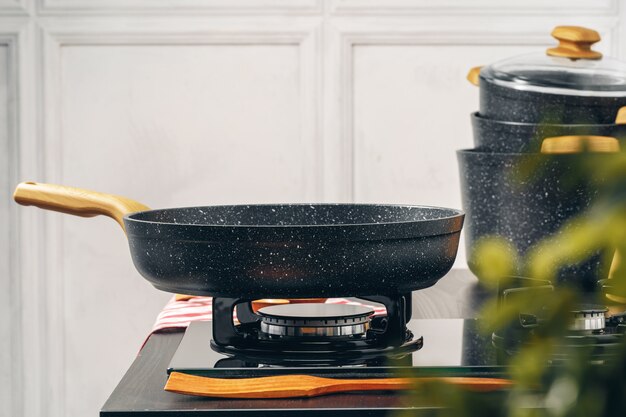 Frying pan on the gas stove in a kitchen