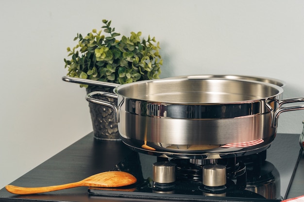 Frying pan on the gas stove in a kitchen