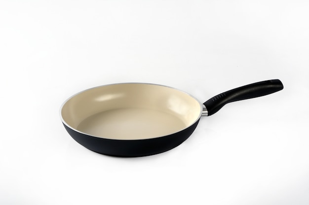 Frying pan with ceramic coating  isolated on white background