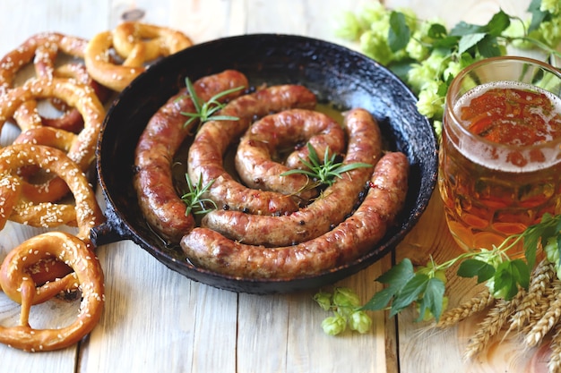 Frying pan with fried Bavarian sausages