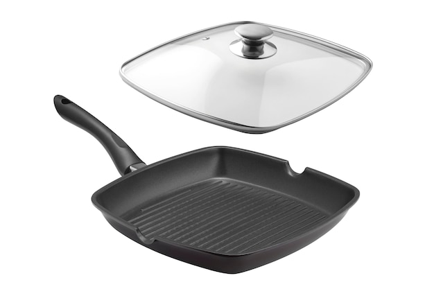 Frying pan with glass cover on white