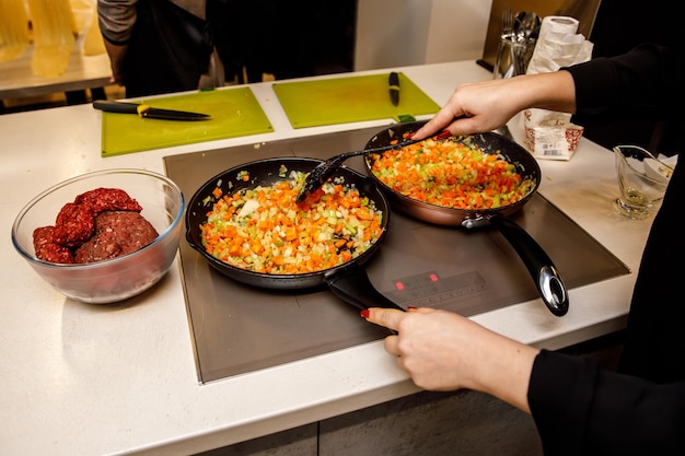 Frying vegetables in a pan