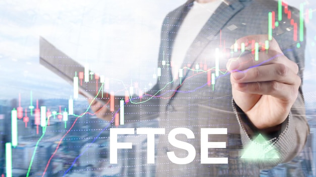 FTSE 100 Financial Times Stock Exchange Index United Kingdom UK England Investment Trading concept with chart and graphs