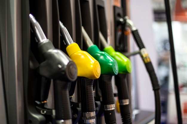 Photo fuel pistols on the petrol station