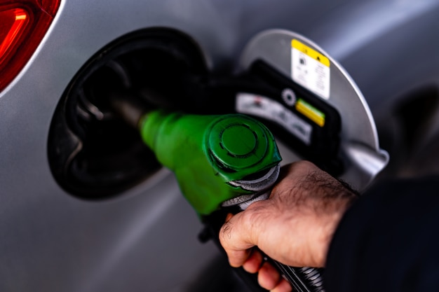 Fueling cars at a gas station