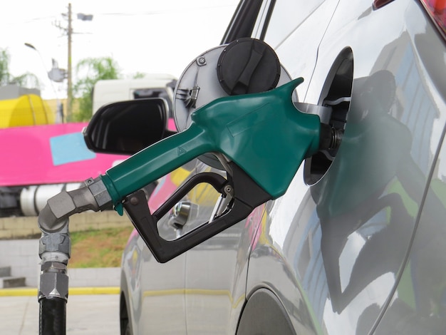 Fueling vehicles with ethanol or gasoline