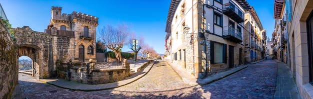 Fuenterrabia or Hondarribia municipality of Gipuzkoa Basque Country Panoramic of the main street and the door in the wall of Santa Maria