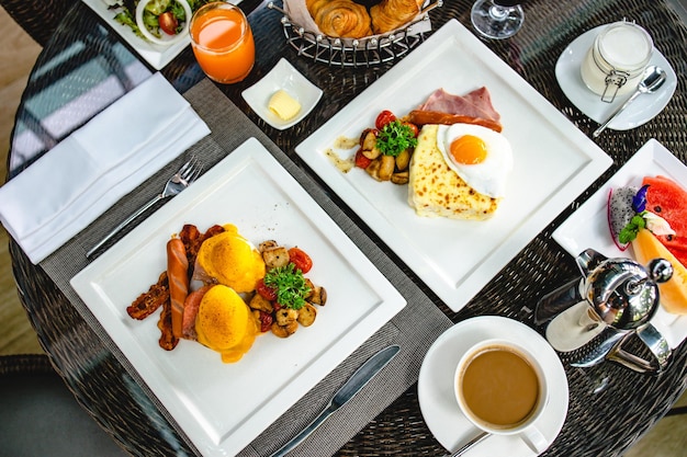 Full American Breakfast Huge healthy breakfast spread on a table with coffee Breakfast served with coffee English breakfast fried egg