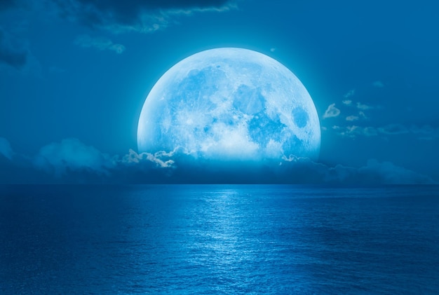 Full Blue Moon amazing planet earth in the foreground Elements of this image furnished by NASA