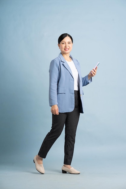 full body photo of a middleaged businesswoman