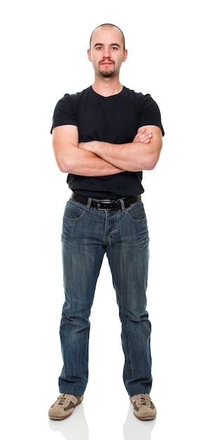 Full body portrait of a man with his arms crossed