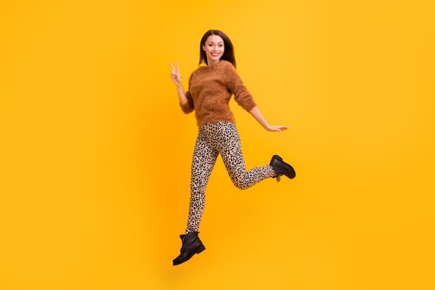 Full body profile photo of funky lady jumping high