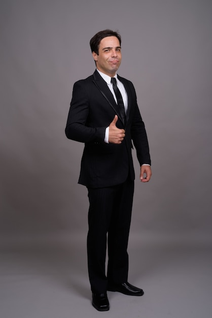 Full body shot of handsome businessman in suit