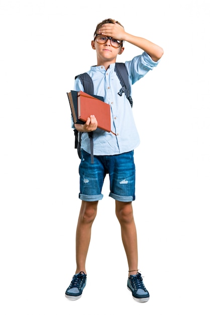 Full body of Student boy with backpack and glasses covering eyes by hands. back to school