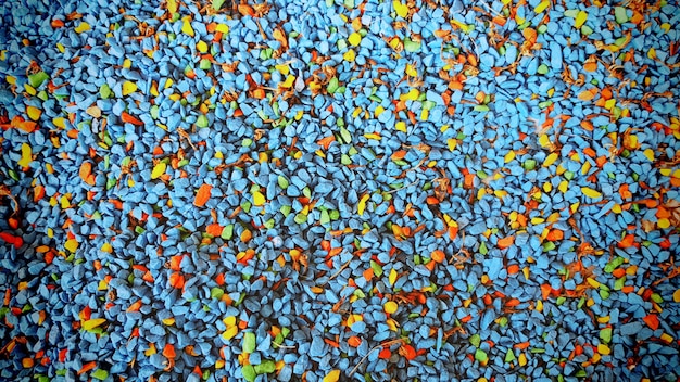full frame background of vivid colorful small gravel stones