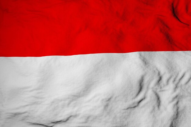 Photo full frame close-up on a waving flag of indonesia in 3d rendering