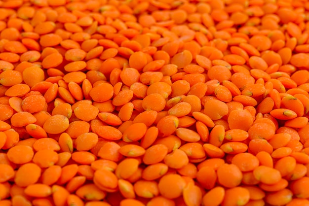 Full frame of red lentils.