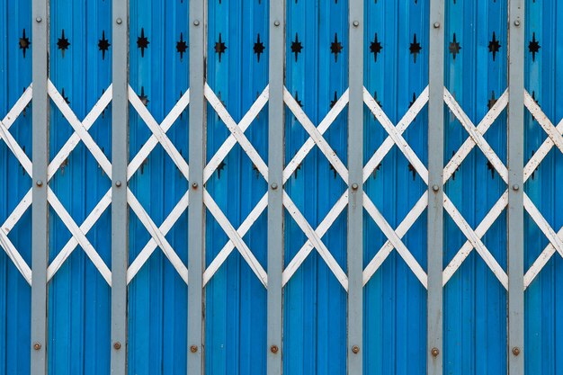 Photo full frame shot of blue metal fence