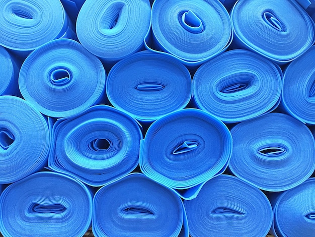 Photo full frame shot of blue rolls stack