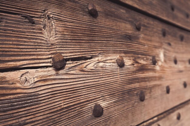 Full frame shot of bolt on wooden planks