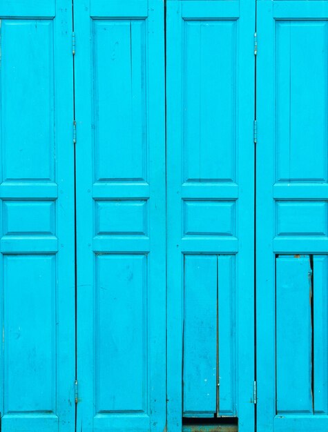 Photo full frame shot of closed blue doors