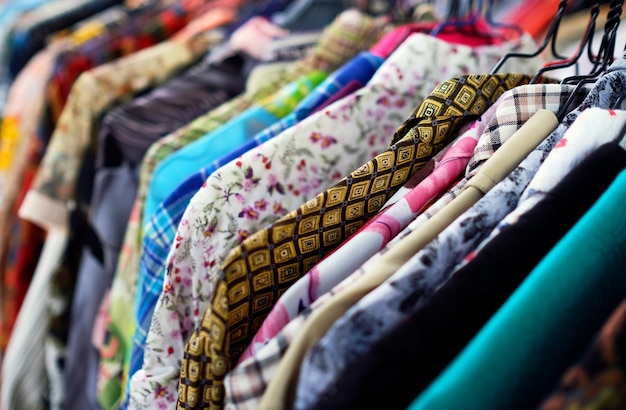 Full frame shot of clothes hanging for sale in store