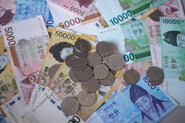 full frame shot of coins and paper currencies