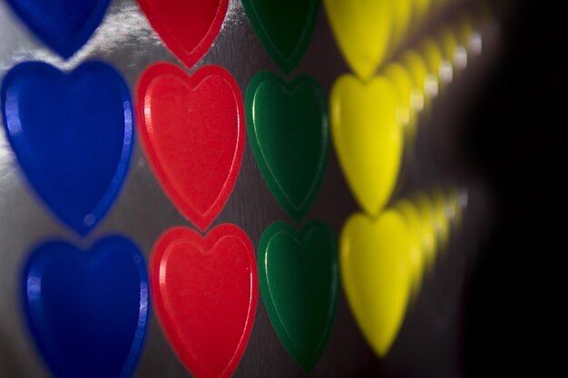 Full frame shot of colorful heart shaped on table