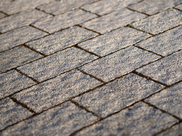 Photo full frame shot of cracked cobblestone