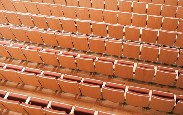 Photo full frame shot of empty chairs in stadium