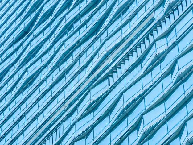 Full frame shot of glass window against blue sky