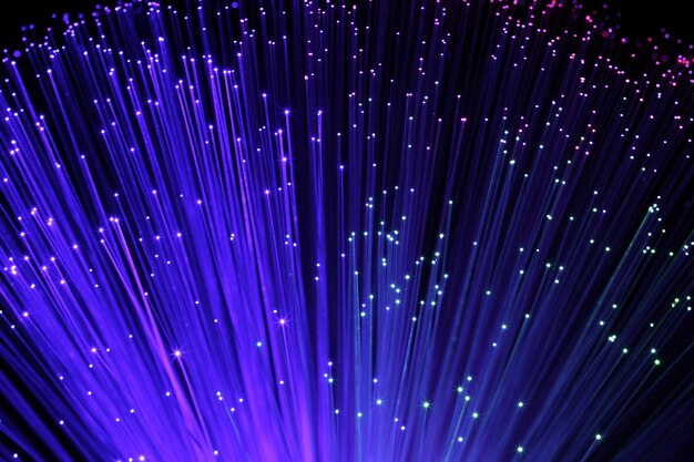 Full frame shot of illuminated blue fiber optic