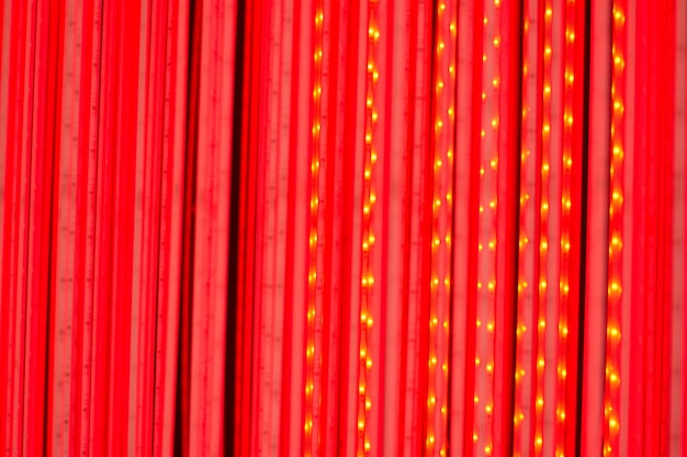 Full frame shot of illuminated red lights