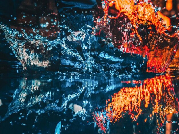 Photo full frame shot of illuminated swimming in sea