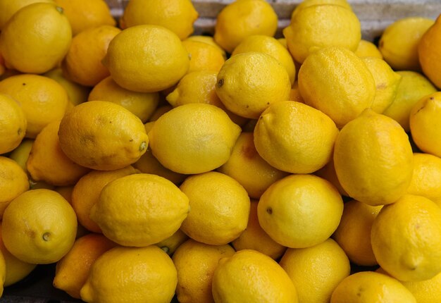 Full frame shot of lemons in market